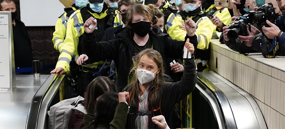 'Greta Mania' Hits Glasgow as Swedish Teen Is Mobbed Upon Arrival for COP26 Summit